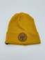 Preview: Hipster Beanie in der Farbe Senfgelb mit braunem Label "There is No Planet B"