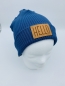 Preview: Hipster Beanie in der Farbe Hellblau mit braunem Label "HELLO"