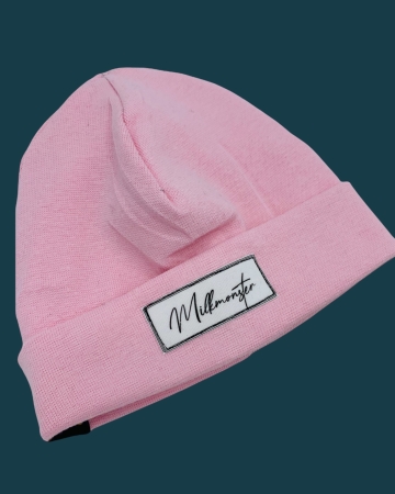 Hipster Beanie in der Farbe Rosa mit weißem Label "Milkmonster"