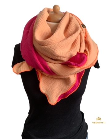 Schal aus Baumwolle in den Farben pink und apricot